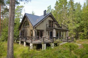 Holiday house at the lake with motorboat