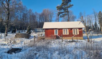 Lantlig stuga med utsikt