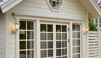 Attefallshus i New England stil