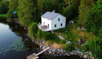 Hus vid Ångermanälven, Höga Kusten