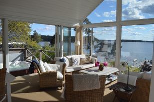 Stenslätten Sjötomt, bubbelpool sandstrand bastu