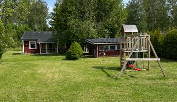 Stugan med sjöutsikt nära bad och handelsbod