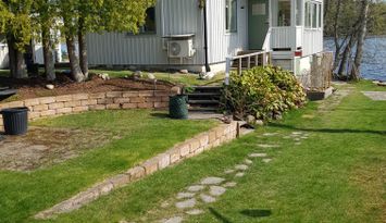 Stuga på en udde vid sjön Södra Barken i Dalarna