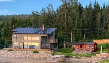 Modernt hus m havstomt & egen brygga i Höga Kusten