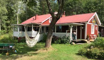 Sommaridyll på egen sjöudde