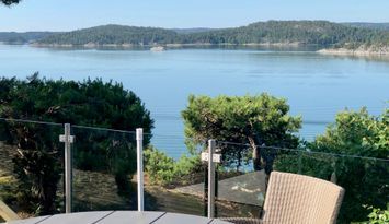 Stockholms skärgård - milsvid utsikt och brygga
