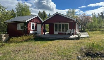 Fin sommarstuga i fina Långsand