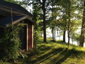 Cosy cottage with private beach