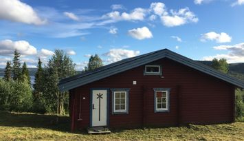 Mysig fjällstuga med utsikt i Stora Blåsjön