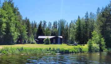 Stuga med bra fiskemöjligheter vid Ljusnans strand