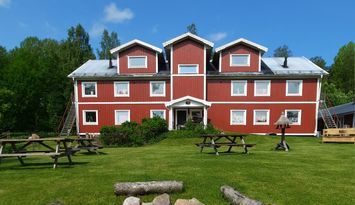 Lägenheter i en svensk villa vid en sjö