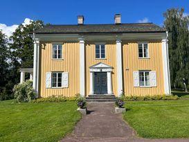 Beautiful manor house wing by lake