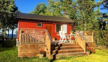 Mysig stuga med havsutsikt