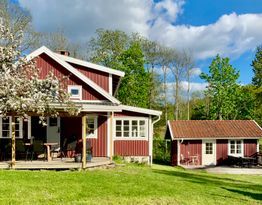 Underbart hus med havsutsikt och badtunna