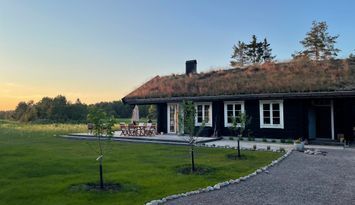 Lyxig stuga med privat kustlinje