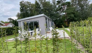Modern stuga på bästa läget i Mellbystrand