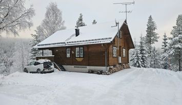 Älvutsikt Sälen, rustik brun stuga