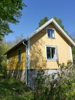 Cozy cottage at the edge of the forest in adorable