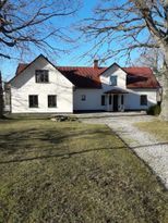 Limestone house at the end of the road in Bunge