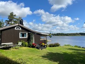 Lakeside Summer Cabin with Private Dock and Boat