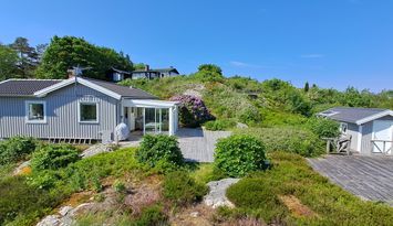 Hyr vår ljusa, fina sommarstuga!