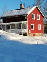 Traditional Swedish farmhouse with big barn