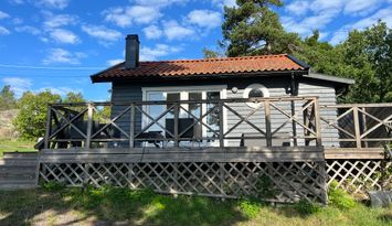 Mysig stuga med toppläge vid havet