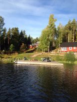 Ferienhauser + Boot auf einer Insel im Runn.See