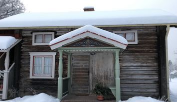 Modernt boende i timmerstuga från 1800-talet