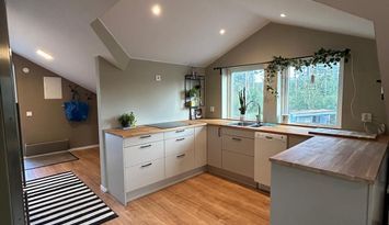 Nybyggd lägenhet med lantligt läge med terrass