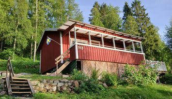 Stuga mitt på Höga Kusten med egen brygga och båt