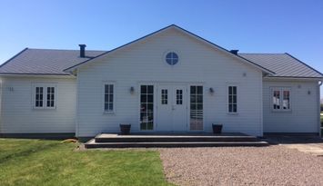 Sommarhus i New Englandstil vid Skummeslövsstrand