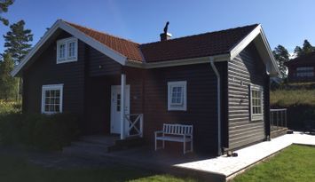 Charmigt hus med gäststuga vid Isabergs Golfbana