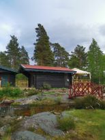 Timber cottage in the forest near Vänern