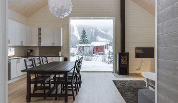 Newly built mountain houses near ski lift